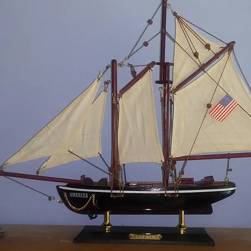 /img/50574-sailboat-diecast-model-caring.webp